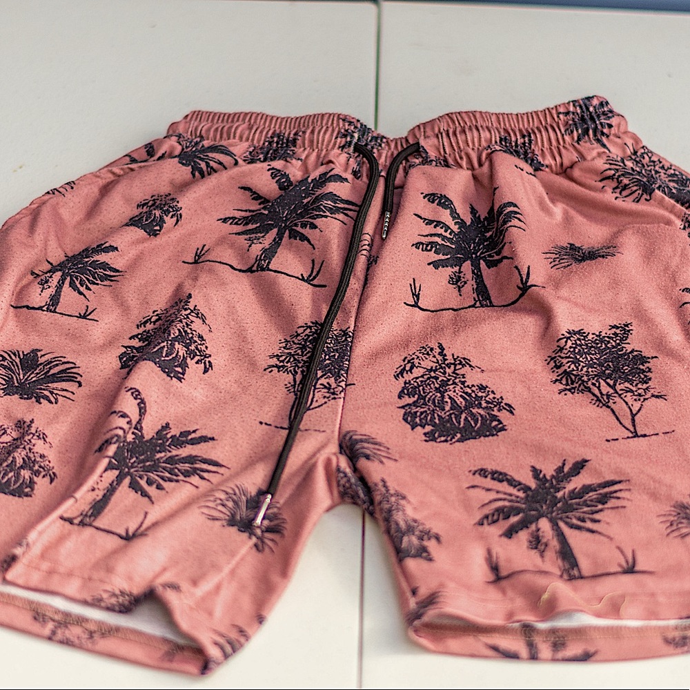 Small, light red, medium length shorts from SHEIN